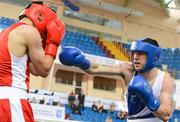 17 April 2012; David Oliver Joyce, right, Ireland, exchanges punches with Artur Bril, Germany, during their Lightweight 60kg bout. AIBA European Olympic Boxing Qualifying Championships, Hayri Gür Arena, Trabzon, Turkey. Picture credit: David Maher / SPORTSFILE