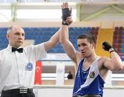 17 April 2012; David Oliver Joyce, Ireland, is declared the winner over Artur Bril, Germany, at the end of their Lightweight 60kg bout. AIBA European Olympic Boxing Qualifying Championships, Hayri Gür Arena, Trabzon, Turkey. Picture credit: David Maher / SPORTSFILE