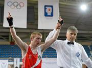 17 April 2012; Paddy Barnes, Ireland, is declared the winner over Istvan Ungvari, Hungary, after the bout was stopped in the second round of their Lightfly 46-49kg bout. AIBA European Olympic Boxing Qualifying Championships, Hayri Gür Arena, Trabzon, Turkey. Picture credit: David Maher / SPORTSFILE