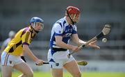 15 April 2012; Matthew Whelan, Laois, in action against Jack Guiney, Wexford. Allianz Hurling League Division 1B Relegtion Play-off, Wexford v Laois, Nowlan Park, Kilkenny. Picture credit: Brian Lawless / SPORTSFILE