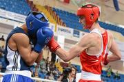 21 April 2012; Adam Nolan, right, Ireland, exchanges punches with Patrick Wocicki, Germany, during the Final of the Welterweight 69kg division. AIBA European Olympic Boxing Qualifying Championships, Hayri Gür Arena, Trabzon, Turkey. Picture credit: David Maher / SPORTSFILE
