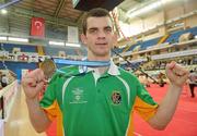 21 April 2012; Adam Nolan, Ireland, celebrates with his gold medal after victory over Patrick Wocicki, Germany, in the Final of the Welterweight 69kg division. AIBA European Olympic Boxing Qualifying Championships, Hayri Gür Arena, Trabzon, Turkey. Picture credit: David Maher / SPORTSFILE