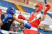 21 April 2012; Adam Nolan, right, Ireland, exchanges punches with Patrick Wocicki, Germany, during the Final of the Welterweight 69kg division. AIBA European Olympic Boxing Qualifying Championships, Hayri Gür Arena, Trabzon, Turkey. Picture credit: David Maher / SPORTSFILE