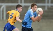 7 August 2017; Seán Hawkshaw of Dublin in action against Fergal Donnellan of Clare during the Electric Ireland All-Ireland GAA Football Minor Championship Quarter-Final match between Dublin and Clare at O'Moore Park, Portlaoise, in Co. Laois. Photo by Piaras Ó Mídheach/Sportsfile