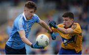 7 August 2017; James Doran of Dublin in action against Fergal Donnellan of Clare during the Electric Ireland All-Ireland GAA Football Minor Championship Quarter-Final match between Dublin and Clare at O'Moore Park, Portlaoise, in Co. Laois. Photo by Piaras Ó Mídheach/Sportsfile