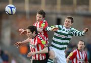 23 April 2012; Ryan McBride, left, and Ruaidhri Higgins, Derry City, in action against Gary Twigg, Shamrock Rovers. Setanta Sports Cup Semi-Final, Second Leg, Derry City v Shamrock Rovers, Brandywell, Derry. Picture credit: Oliver McVeigh / SPORTSFILE