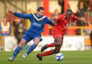 23 April 2012; Joseph Ndo, Sligo Rovers, in action against Davi Rainey, Crusaders. Setanta Sports Cup Semi-Final, Second Leg, Sligo Rovers v Crusaders, The Showgrounds, Sligo. Picture credit: David Maher / SPORTSFILE