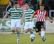 23 April 2012; Stephen McLaughlin, Derry City, in action against Ken Oman, Shamrock Rovers. Setanta Sports Cup Semi-Final, Second Leg, Derry City v Shamrock Rovers, Brandywell, Derry. Picture credit: Oliver McVeigh / SPORTSFILE