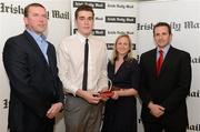 16 April 2012; Fiontain O Currain, DCU, is presented with the Irish Daily Mail Gaelic Football Future Champions 2012 award by Irish Daily Mail GAA columnist Liam Hayes, left, Niamh Nic Liam, marketing manager Irish Daily Mail, and, right, Chairman Comhairle Ardoideachais Ray O'Brien. Irish Daily Mail Future Champions Awards 2012, Croke Park, Dublin. Photo by Sportsfile