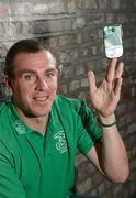 25 April 2012; Republic of Ireland defender Richard Dunne is calling on fans to go green with pride as he  announces the launch of the Three Ireland Samsung Supporters Kit, which includes a limited edition Samsung Galaxy Mini handset preloaded with two of the hottest football Apps for Republic of Ireland supporters; the 3Football App and and the new Three Football Flick Kick game. In attendance at the launch is Republic of Ireland International Richard Dunne. Three's Office, Clarendon Road, Dublin. Picture credit: David Maher / SPORTSFILE