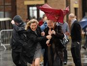 25 April 2012; Orla Kelly, from Kill, Co. Kildare, left, and Diane Murphy, from Dunboyne, Co. Meath, arrive for the second day of the Punchestown Racing Festival. Punchestown Racecourse, Punchestown, Co. Kildare. Picture credit: Stephen McCarthy / SPORTSFILE