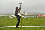 25 April 2012; Punchestown Groundsman Tony McManaman removes fencing posts ahead of the second day of the Punchestown Racing Festival. Punchestown Racecourse, Punchestown, Co. Kildare. Picture credit: Barry Cregg / SPORTSFILE
