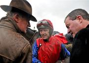 26 April 2012; Jockey Ruby Walsh speaking with trainer Willie Mullins, left, and Ger O'Brien, right, of the Hammer & Trowel Syndicate, after winning the Ladbrokes.com World Series Hurdle on Quevega. Punchestown Racing Festival, Punchestown Racecourse, Punchestown, Co. Kildare. Picture credit: Barry Cregg / SPORTSFILE