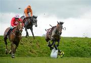 26 April 2012; Outlaw Pete jumps over jockey Josh Halley after he was unseated from his mount jumping Ruby's Double, as De Danu, left, with Nigel Slevin up, and Shalimar Fromentro, centre, with James Reveley up, avoid the fallen rider during the Avon Ri Corporate & Leisure Resort Steeplechase for the La Touche Cup. Punchestown Racing Festival, Punchestown Racecourse, Punchestown, Co. Kildare. Picture credit: Barry Cregg / SPORTSFILE