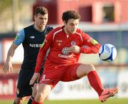 27 April 2012; Mark Quigley, Sligo Rovers, in action against James Chambers, St Patrick's Athletic. Airtricity League Premier Division, Sligo Rovers v St Patrick's Athletic, The Showgrounds, Sligo. Picture credit: David Maher / SPORTSFILE