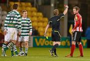 27 April 2012; Patrick McEleney, Derry City, receives a red card from referee Anthony Buttimer. Airtricity League Premier Division, Shamrock Rovers v Derry City, Tallaght Stadium Tallaght, Co. Dublin. Picture credit: Stephen McCarthy / SPORTSFILE