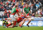 29 April 2012; Michael Shields, Cork, in action against Andy Moran and Cillian O'Connor, right, Mayo. Allianz Football League, Division 1 Final, Cork v Mayo, Croke Park, Dublin. Picture credit: Oliver McVeigh / SPORTSFILE