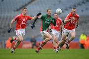 29 April 2012; Keith Higgins, Mayo, in action against Daniel Goulding, left, and Nicholas Murphy, Cork. Allianz Football League, Division 1 Final, Cork v Mayo, Croke Park, Dublin. Picture credit: Ray McManus / SPORTSFILE