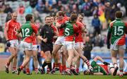 29 April 2012; Lee Keegan, Mayo, in dispute with Paudie Kissane, Cork, as Referee Maurice Deegan watches on. Allianz Football League, Division 1 Final, Cork v Mayo, Croke Park, Dublin. Picture credit: Oliver McVeigh / SPORTSFILE