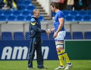 29 April 2012; Leinster head coach Joe Schmidt greets former Leinster player Nathan Hines, now of ASM Clermont Auvergne, ahead of the game. Heineken Cup Semi-Final, ASM Clermont Auvergne v Leinster, Stade Chaban Delmas, Bordeaux, France. Picture credit: Stephen McCarthy / SPORTSFILE