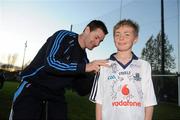 11 May 2012; Dublin supporter Sean Barrett has his jersey signed by Dublin hurler Niall Corcoran during the Dublin GAA Open Day 2012. Fingallians GAA Club, Dublin. Picture credit: Stephen McCarthy / SPORTSFILE