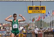 13 May 2012; Ireland's Colin Griffin celebrates securing the Olympic Games 'A' Standard time, after finishing in 15th position, with a time of 3.52:55, during the Men's 50km Race Walk event. IAAF World Race Walking Cup, Saransk, Russia. Picture credit: James Veale / SPORTSFILE