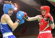 15 May 2012; Ceire Smith, Ireland, right, exchanges punches with Karolina Michalczuk, Poland, during their Flyweight 51kg Bout. AIBA Women's World Boxing Championships, Qinhuangdao, China. Picture credit: David Maher / SPORTSFILE