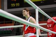 16 May 2012; Katie Taylor, Ireland, smiles after she stepped into the ring before being declared the winner by referee Vladislav Malyshev, after a walk over against Mihaela Lacatus, Romania, in their Lightweight 60kg Bout. The result means Katie qualifies for the London 2012 Olympic Games. AIBA Women's World Boxing Championships, Qinhuangdao, China. Picture credit: David Maher / SPORTSFILE