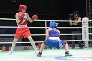 18 May 2012; Katie Taylor, Ireland, left, exchanges punches with Mavzuna Chorieva, Tajikistan, during their Lightweight Semi-Final bout. AIBA Women's World Boxing Championships, Qinhuangdao, China. Picture credit: David Maher / SPORTSFILE