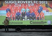 18 May 2012; Sligo Rovers supporter John Kilfeather, from Sligo town, takes shelter from the windy conditions before the game. Airtricity League Premier Division, Sligo Rovers v Shelbourne, The Showgrounds, Sligo. Picture credit: Barry Cregg / SPORTSFILE