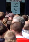 16 August 2002; Dublin supporters queueing for tickets for the Bank of Ireland All-Ireland Senior Football Championship Replay match between Dublin and Donegal at Croke Park tomorrow. Photo by Damien Eagers/Sportsfile