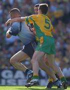 17 August 2002, Ciarán Whelan of Dublin in action against Raymond Sweeney of Donegal during the Bank of Ireland All-Ireland Senior Football Championship Quarter-Final Replay match between Dublin and Donegal at Croke Park in Dublin. Photo by Brendan Moran/Sportsfile