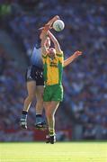 17 August 2002; Darren Magee of Dublin in action against Paul McGonigle of Donegal during the Bank of Ireland All-Ireland Senior Football Championship Quarter-Final Replay match between Dublin and Donegal at Croke Park in Dublin. Photo by Ray McManus/Sportsfile