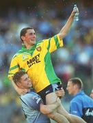 17 August 2002; Dublin's Alan Brogan is lifted by team-mate Darren Magee as they celebrate after the Bank of Ireland All-Ireland Senior Football Championship Quarter-Final Replay match between Dublin and Donegal at Croke Park in Dublin. Photo by Ray McManus/Sportsfile