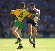 17 August 2002; Alan Brogan of Dublin in action against Noel McGinley of Donegal during the Bank of Ireland All-Ireland Senior Football Championship Quarter-Final Replay match between Dublin and Donegal at Croke Park in Dublin. Photo by Ray McManus/Sportsfile