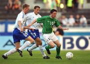 21 August 2002; Robbie Keane of Republic of Ireland in action against Hannu Tihinen and Mika Nurmela of Finland during the International Friendly match between Finland and Republic of Ireland at the Olympic Stadium in Helsinki, Finland. Photo by David Maher/Sportsfile