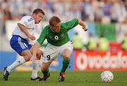 21 August 2002; Damien Duff of Republic of Ireland in action against Teemu Taino of Finland during the International Friendly match between Finland and Republic of Ireland at the Olympic Stadium in Helsinki, Finland. Photo by David Maher/Sportsfile