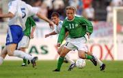 21 August 2002; Thomas Butler of Republic of Ireland in action against Hannu TIhinen, 5, and Teemu Tainio of Finland during the International Friendly match between Finland and Republic of Ireland at the Olympic Stadium in Helsinki, Finland. Photo by David Maher/Sportsfile
