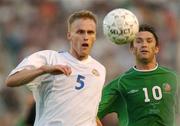 21 August 2002; Robbie Keane of Republic of Ireland in action against Hannu Tihinen of Finland during the International Friendly match between Finland and Republic of Ireland at the Olympic Stadium in Helsinki, Finland. Photo by David Maher/Sportsfile