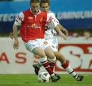 23 August 2002; Philip Hughes of St Patrick's Athletic in action against Kevin Hunt of Bohemians during the eircom League Premier Division match between St Patrick's Athletic and Bohemians at Richmond Park in Dublin. Photo by David Maher/Sportsfile