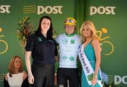 26 May 2012; Richard Handley, Rapha Condor Sharp, is presented with his Irish Sports Council leading U23 rider jersey by Nadine McCormilla, Co-ordinator, Cavan Local Sports Partnership and Miss An Post Rás Marie Langan following the seventh stage of the 2012 An Post Rás. Donegal - Cootehill. Picture credit: Stephen McCarthy / SPORTSFILE