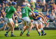 27 May 2012; Patrick Maher, Tipperary, tries to break through the defence of, from left, Wayne Mcnamara, Brian Geary, Tom Condon, and Stephen Walsh, Limerick. Munster GAA Hurling Senior Championship Quarter Final, Tipperary v Limerick, Semple Stadium, Thurles, Co. Tipperary. Picture credit: Barry Cregg / SPORTSFILE