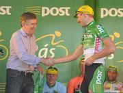 27 May 2012; Gediminas Bagdonas, An Post Sean Kelly team, is presented with the An Post points leader jersey by An Post Chief Executive Donal Connell following the 2012 An Post Rás. Cootehill - Skerries. Picture credit: Stephen McCarthy / SPORTSFILE