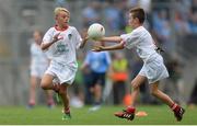 27 August 2017; Ronán Teahan of Aughatubrid NS, Co Kerry, representing Tyrone, and Cian Flynn of Holy Family NS, Co Sligo, representing Tyrone, right, during the INTO Cumann na mBunscol GAA Respect Exhibition Go Games at Dublin v Tyrone - GAA Football All-Ireland Senior Championship Semi-Final at Croke Park in Dublin. Photo by Piaras Ó Mídheach/Sportsfile