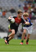 26 August 2017; Members of the Ballintubber GAA Club, Mayo, and Dr Crokes GAA Club, Kerry, during the INTO Cumann na mBunscol GAA Respect Exhibition Go Games at half time during the GAA Football All-Ireland Senior Championship Semi-Final Replay match between Kerry and Mayo at Croke Park in Dublin. Photo by Ray McManus/Sportsfile