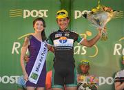 27 May 2012; Thomas Rostollan, France AVC Aix En Provence, who placed second overall during the 2012 An Post Rás, with Miss An Post Rás Skerries Isabele Cooke. Cootehill - Skerries. Picture credit: Stephen McCarthy / SPORTSFILE