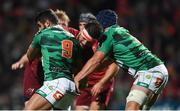 1 September 2017; Jean Kleyn of Munster is tackled by Tito Tebaldi, left, and Marco Lazzaroni of Benetton during the Guinness PRO14 Round 1 match between Munster and Benetton at Irish Independent Park in Cork. Photo by Eóin Noonan/Sportsfile