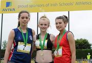 2 June 2012; Gold medal winner Laura Ann Costello, centre, from Dunmore CS, Co. Galway, with second place Roseanna McGuckian, Ballymena Academy, Co. Antrim, left, and third place Rachel Doyle, right, from, St Leo's College, Carlow, after the Junior Girls 100m at the Aviva All Ireland Schools’ Track and Field Championships 2012. Tullamore Harriers AC, Tullamore, Co. Offaly. Picture credit: Matt Browne / SPORTSFILE
