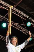 6 June 2012; Irish Olympian & 5000m silver medallist Sonia O'Sullivan with the Olympic Flame during the London 2012 Olympic Torch Relay. St. Stephen's Green, Dublin. Picture credit: Brian Lawless / SPORTSFILE