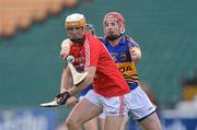 6 June 2012; Mark Surgue, Cork, in action against Denis Maher, Tipperary. Bord Gais Energy Munster GAA Hurling Under 21 Championship Quarter-Final, Cork v Tipperary, Pairc Ui Chaoimh, Cork. Picture credit: Diarmuid Greene / SPORTSFILE